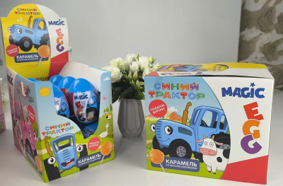 СИНИЙ ТРАКТОР MAGIC EGG Карамель на палочке в пласт. Яйце+подарком 12шт/уп 10г. УТ73893    